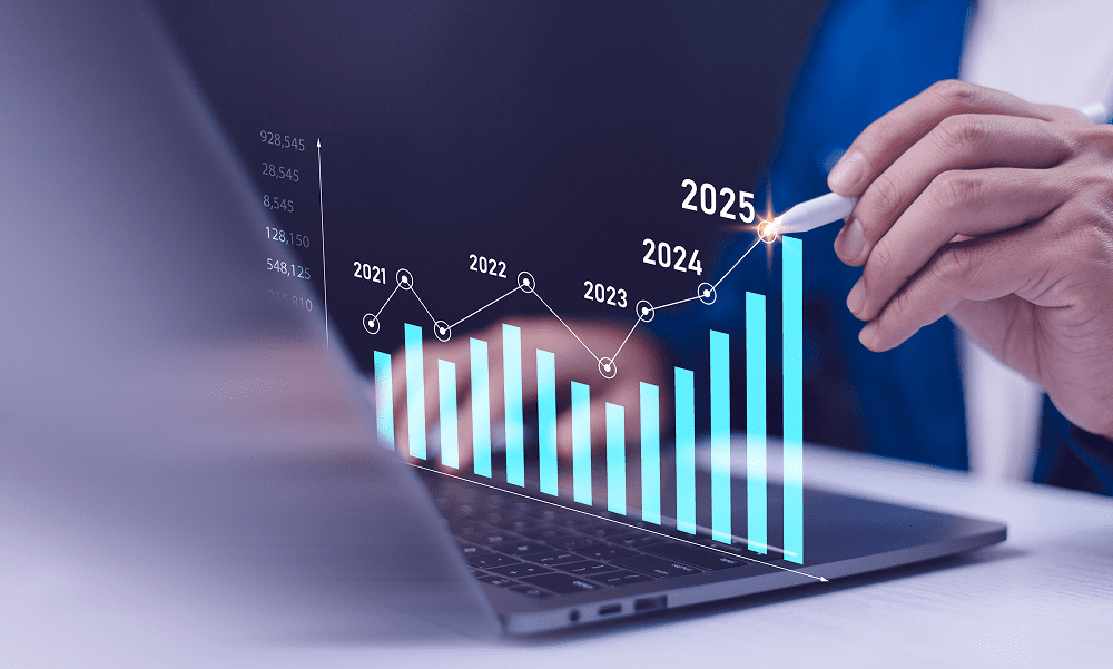 Business analyst pointing at rising 2025 chart