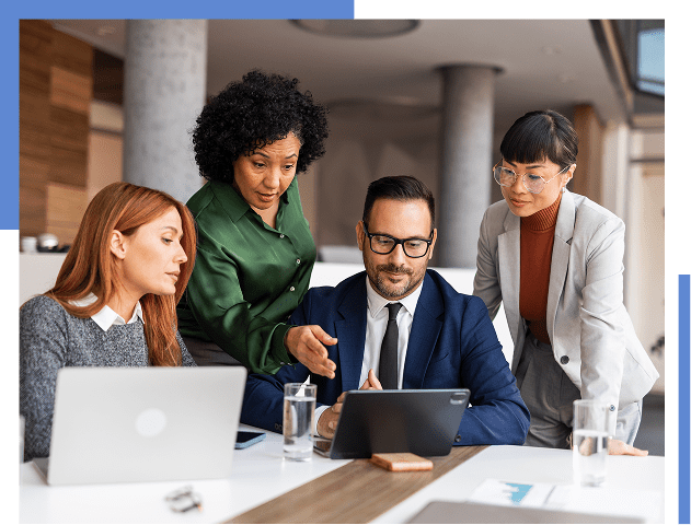 Team discussing project around a table.