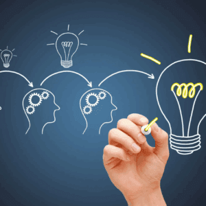 Hand drawing light bulb and human heads.