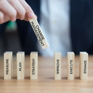 Jenga blocks illustrating change management process steps.